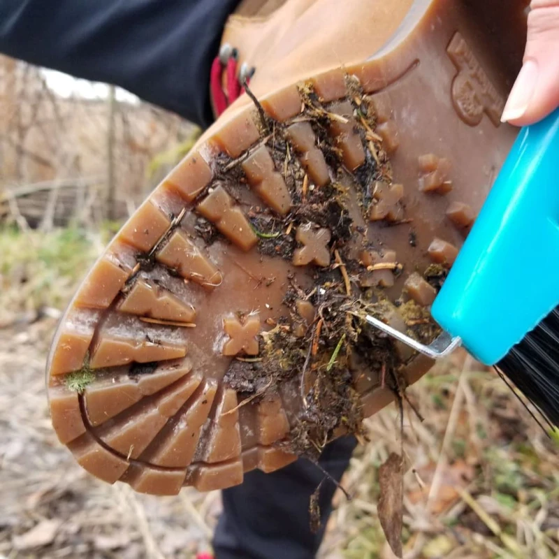 Person using a Boot Brush